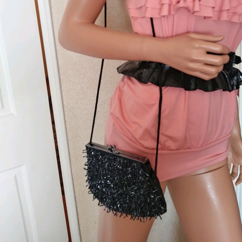 Beaded evening mini bag in shimmering grayish charcoal color. Used once